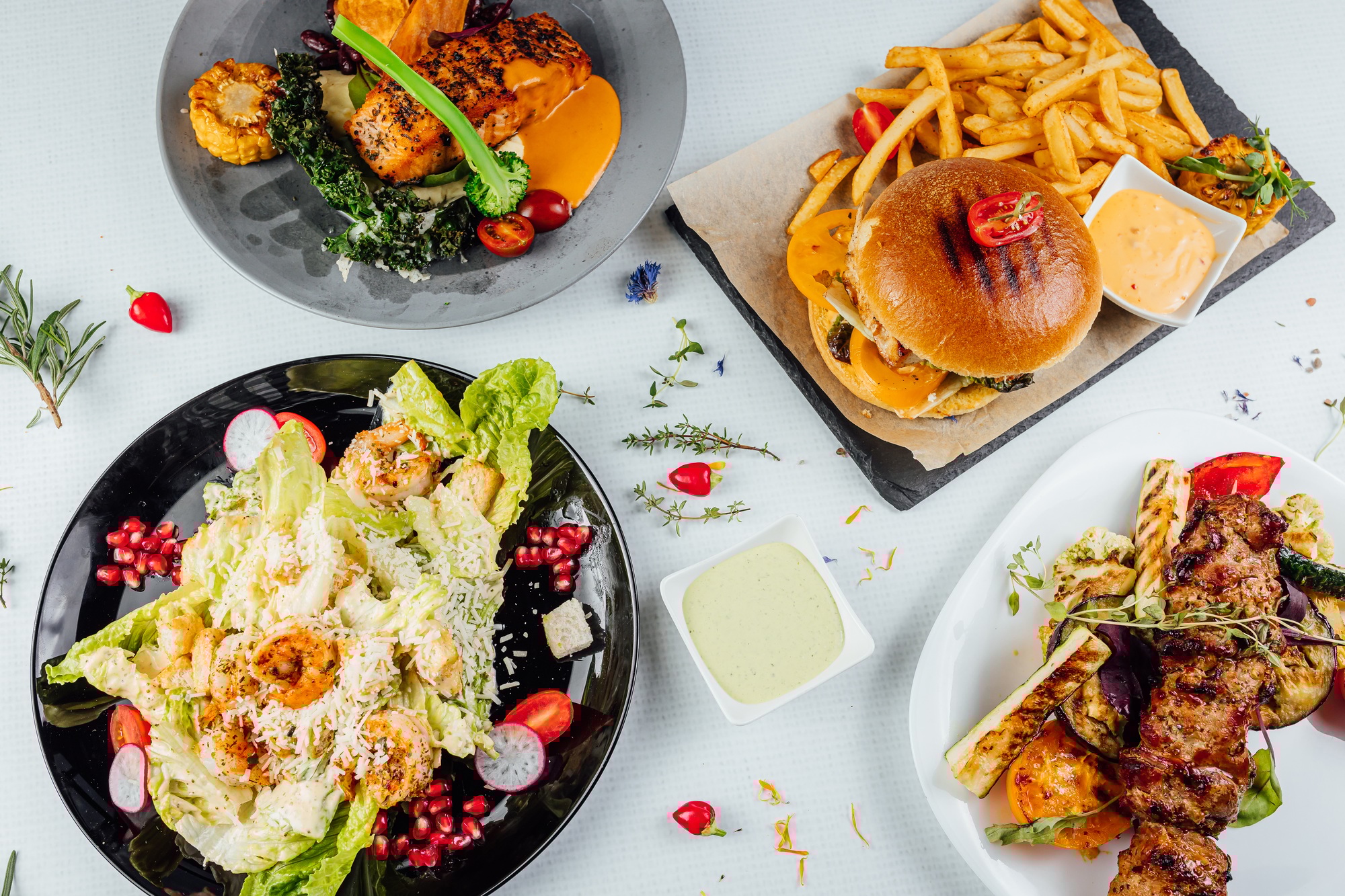 Top view of a restaurant table with delicious gourmet foods